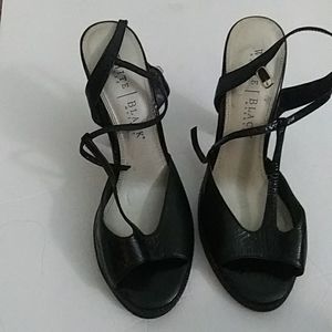 White House..black market strappy black heels in size 8.5.. Open toe